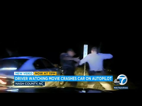 Video: Tesla on autopilot crashes into state trooper's cruiser due to driver watching a movie l ABC7