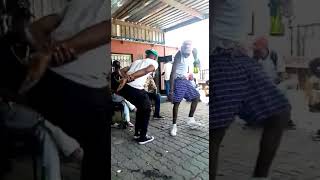 Manizo dancing with his crew