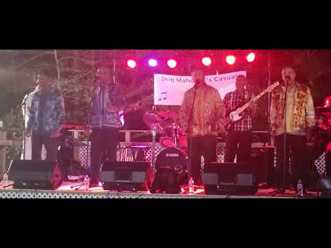 Skip Mahoney's Casuals sings "Love Is Here" at The Hines residence. 