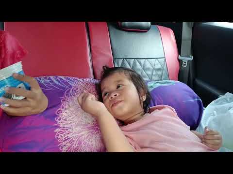 Afifah eats ice cream