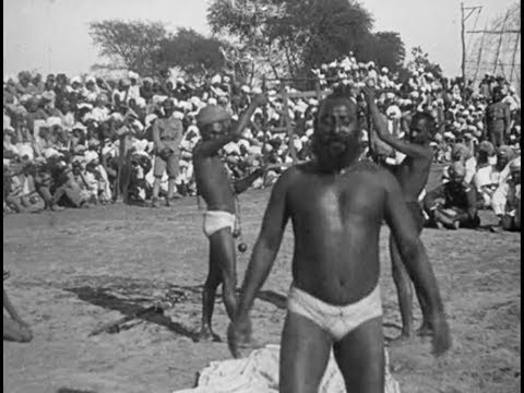 A Sword Dance Performed before the King and Queen in India (1912)