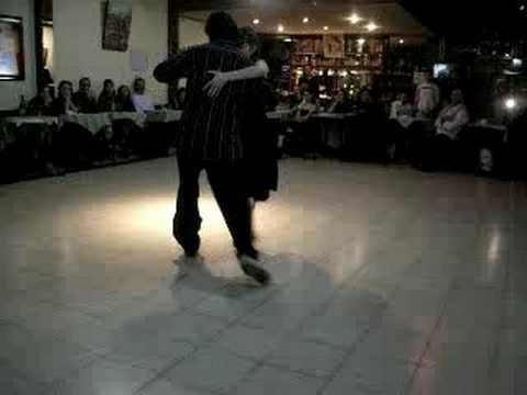  Federico Naveira  and  Inés Muzzopappa  are  dancing  to  the  tango  "  Cantando  "