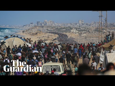 Thousands of Palestinians seen heading towards Gaza City as ceasefire comes into effect