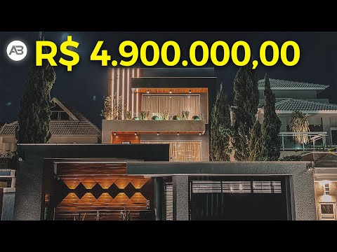 WONDERFUL HOUSE WITH CONTEMPORARY DESIGN IN A HIGH-END CONDOMINIUM IN BARRA DA TIJUCA.