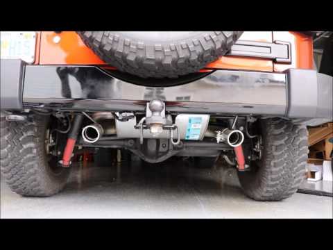 Dynomax Super Turbo dual exhaust Before and after sounds on a 2014 JK  Jeep Wrangler Willys Wheeler