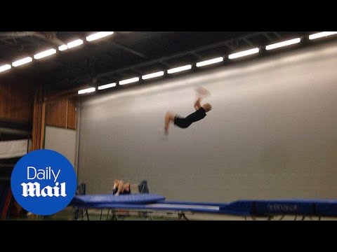 Basketball player makes basket after bouncing of trampoline - Daily Mail