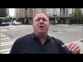 Alex Jones Chases After Guy Who Flips Him Off But The MW2: Juggernaut Music Plays Over It