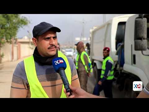 عمال البلدية في الناصرية يواصلون عملهم لساعات طويلة رغم الرواتب 