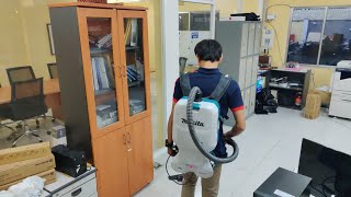 Testing Makita Cordless 32mm backpack Vacuum Cleaner DVC660 at office