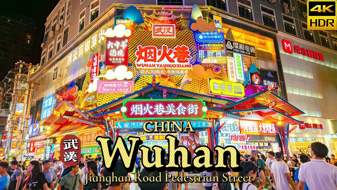 Immersive street-level walking tour through Wuhan Jianghan Road, China, showcasing authentic urban landscapes, local architecture, and the vibrant atmosphere of the city's neighborhoods