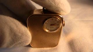 Reuge musical charm with watch