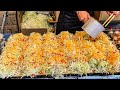 japanese street food - hiroshima style okonomiyaki  お好み焼き ( hiroshimayaki )