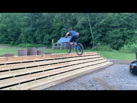 Mountain Biker Bunny Hops Up Stair set