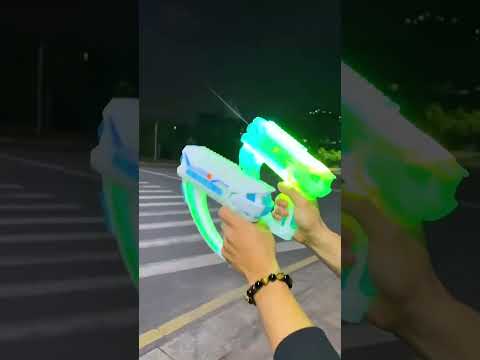 Beach & Pool Colorful Electric Water Gun - Space Glow Blaster with LED Effects, One-Button Firing Summer Toy video
