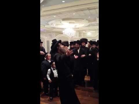Hatzadik Reb Nachmen Biderman dancing at wedding