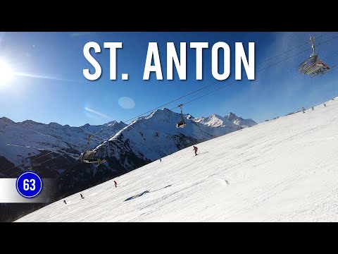 Skiing easy blue piste 63 'Osthang Einfahrt' in St Anton Ski Arlberg.