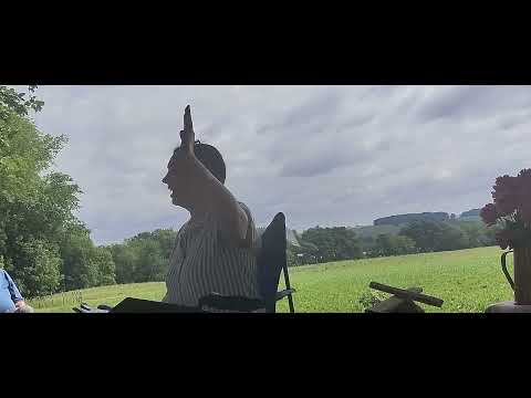 Danae speaks to OMC under the trees 5/12/22