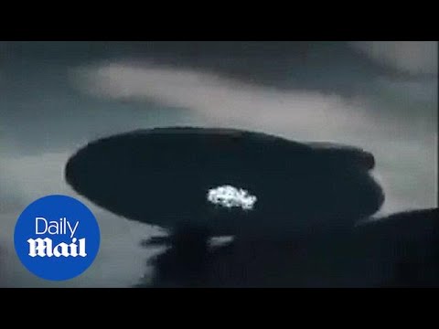 Bizarre footage from Malaysia shows giant UFO hovering - Daily Mail