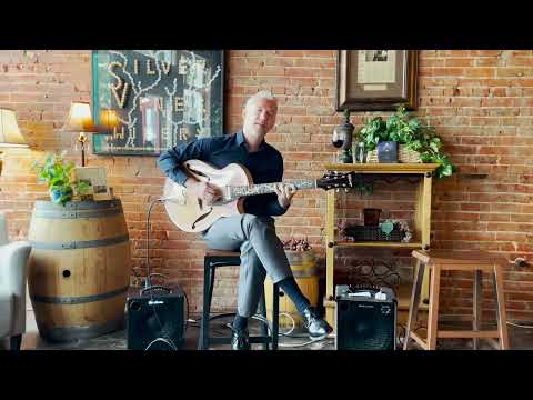 Doug Martin paired with a Otto D'Ambrosio Archtop, just beautiful!