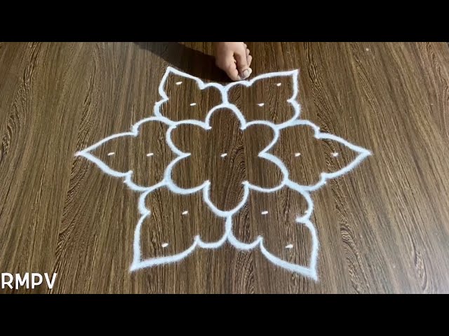 Simple dotted rangoli design by rmpv creations