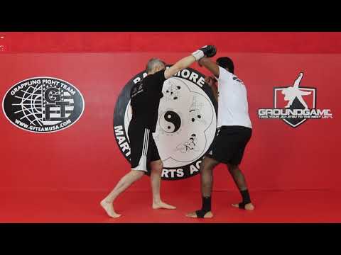 Hak Kor Erawan - Lead block to clinch, rear knee