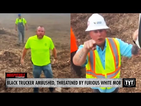 Armed White Mob Ambushes Black Trucker, Hurts Dog Before Tipping Truck With Bulldozers