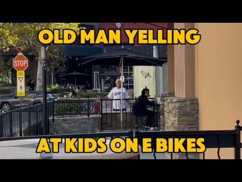 Old man tries to fight kids on e bikes 
