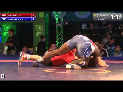 Round 3 FS - 97 kg: Javier CORTINA LACERRA (CUB) df. Azret SHOGENOV (RUS), 8-2