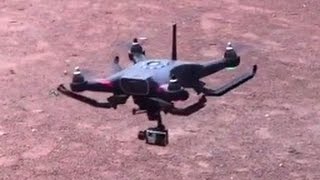 TTRobotix Ghost+ Vision360 stirring up the blowing dust along the course. ( Thunder Tiger )