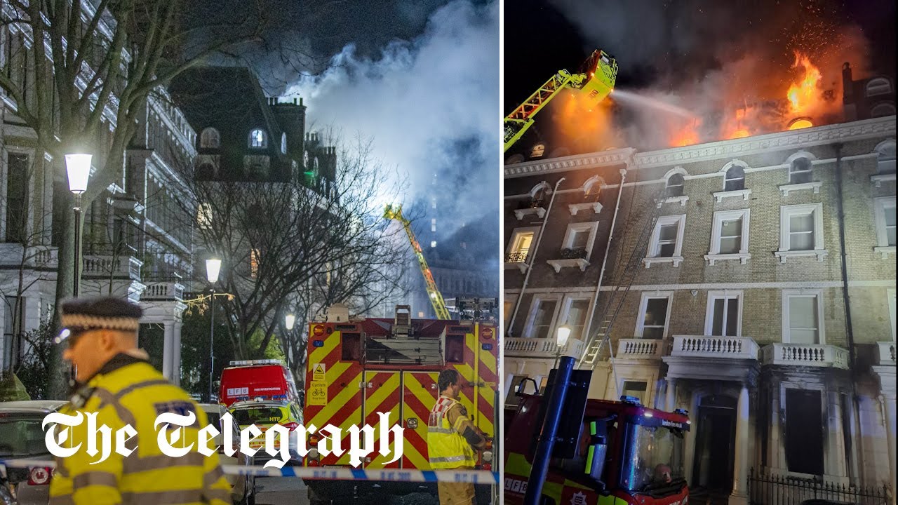 Eight police officers who tried to rescue victims of a house fire hospitalised