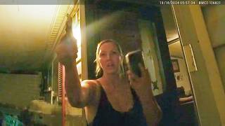 Woman Walks Out Pointing Revolver at Cop