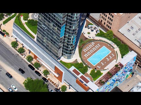 The pool deck, grills and birch grove at the South Loop’s 1001 South State