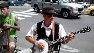 Got my mojo workin. J.R.Willis:banjo, Sheldon Ziro:harmonica, Eric Campbell: washboard