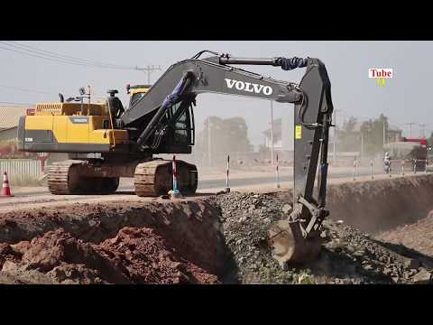Volvo Excavator driving on road & work