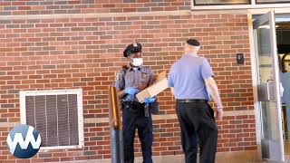 Officers from the NYPD 70th Precinct Distribute Hand Sanitizer on Avenue J in Brooklyn, New York