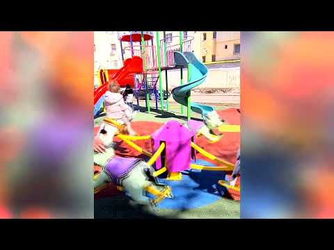 Narcisa in the children's park! she is two years old