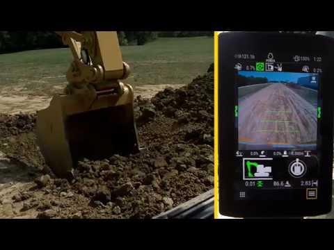 Grade Assist - Ausleger und Anbaugerät