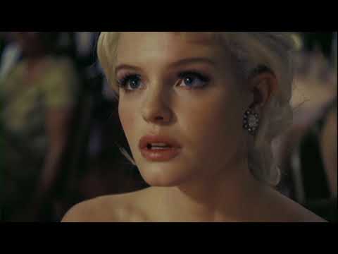 Trailer frame — slow dance spotlight, strings swelling to a torch-song cadence