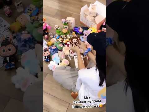 #Lisa celebrating 104 million followers on her IG with #labubu