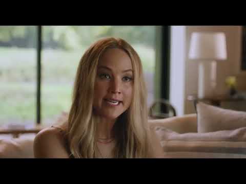 No Hard Feelings official trailer frame: Maddie and Percy in a car with the Montauk shoreline flashing by