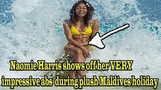 Naomie Harris shows off her VERY impressive abs during plush Maldives holiday
