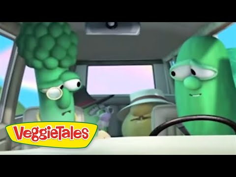 Animated VeggieTales scene: a broccoli and a green bean driving a car, smiling at each other, with the VeggieTales logo in the corner.