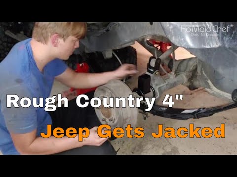 How To Install Rough Country 4-Inch Suspension Lift Kit With Shocks "Rear Only" || Jeep Mods E41