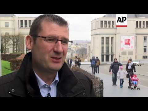 Brussels marked by pain of attacks a year ago