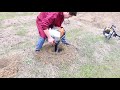 63CC EARTH AUGER WORKING WITH 300MM DRILL BIT