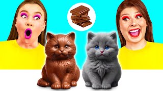 Download the video "Thử thách Đồ Ăn Từ Sô Cô La vs Đồ Thật | Thử Thách Vui Nhộn GoFun Challenge"