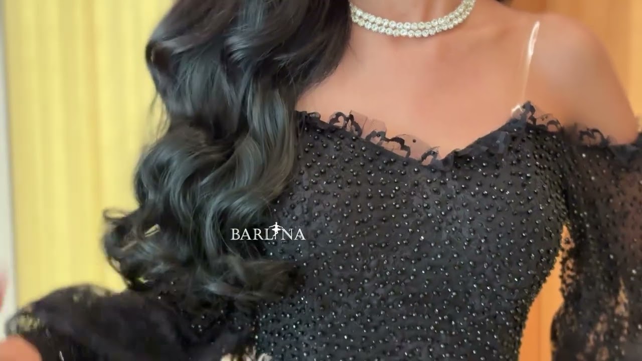 Black dress embroidered with elegant gold details - M