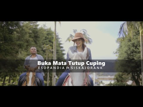 Lagu Karo Terbaru Buka Mata Tutup Cuping - Eso Pandia ft Siska Jorank [Official Music Video]