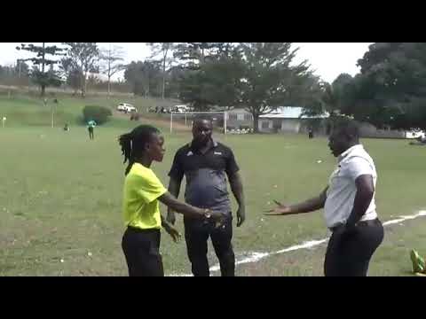 UGANDAN FEMALE REFEREE ANNOYED AND HANDS OVER WHISTLE TO COACH