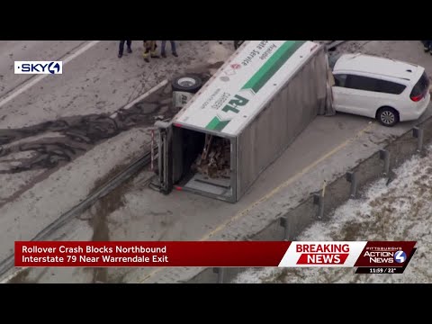 Tractor trailer crashes into van, closing portion of I-79